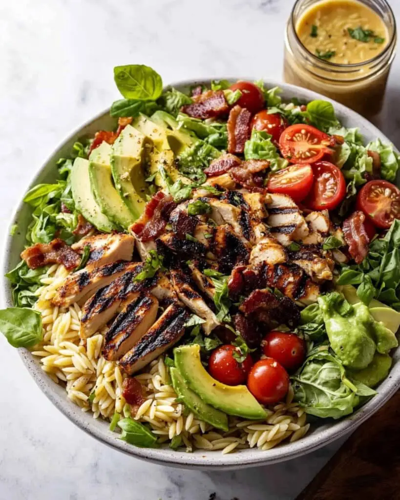 Grilled Lemon Herb Chicken Avocado Orzo Salad with Honey Mustard Bacon Dressing Recipe