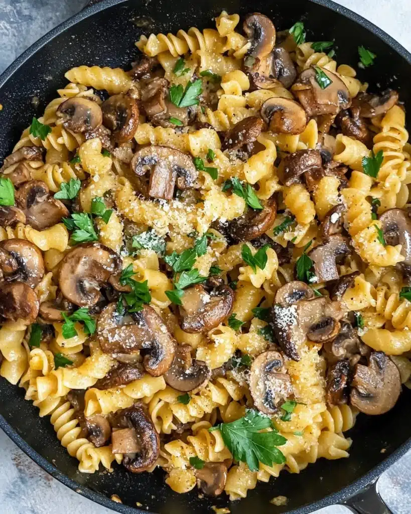 Garlic Mushroom Pasta with Wine, Parmesan, and Walnuts Recipe