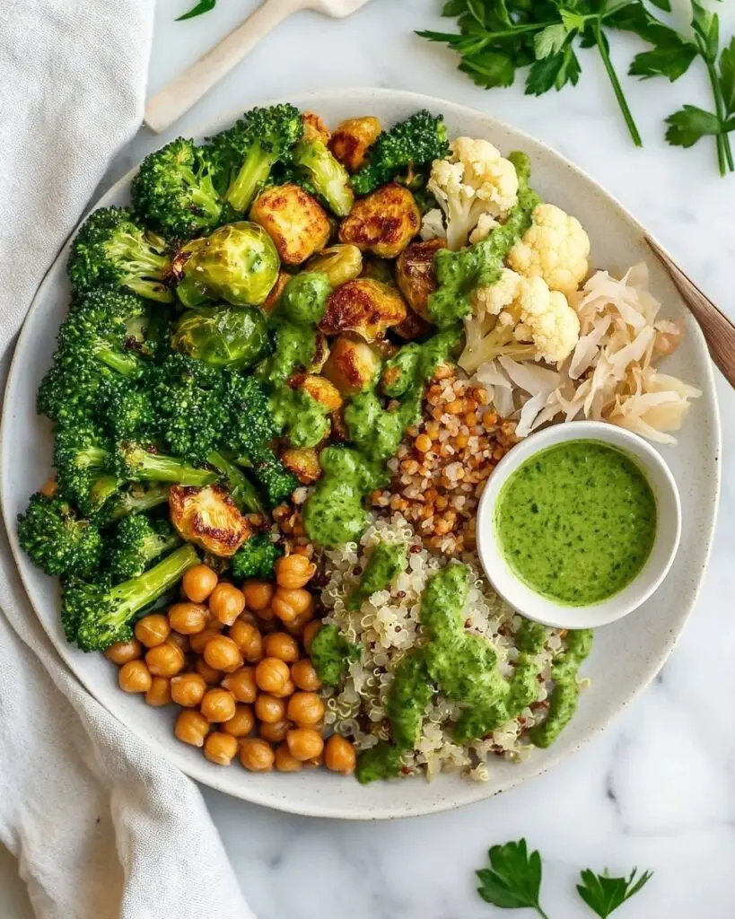 Roasted Veggie Grain Bowl with Kale Pepita Pesto and Pickled Sauerkraut Recipe