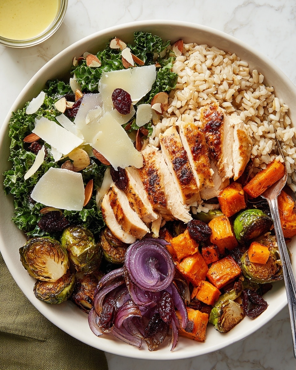 A white bowl on a white marbled surface holds a colorful healthy meal organized in five main sections. The base layer is white rice, spread on the bottom and peeking through between other layers. In the center, there are slices of light brown cooked chicken with a glossy sauce and black pepper sprinkled on top. On the right side, there are thin slices of green avocado, fresh and smooth in texture. Next to the avocado are orange, cubed roasted vegetables with a slightly rough texture. On the top left, there are roasted Brussels sprouts showing a mix of dark green and lightly charred edges. At the bottom left are glossy, bright red pomegranate seeds along with a cluster of medium brown pecans. A spoon with some sauce rests on the white marbled surface above the bowl, with sauce drips nearby. Photo taken with an iphone --ar 4:5 --v 7