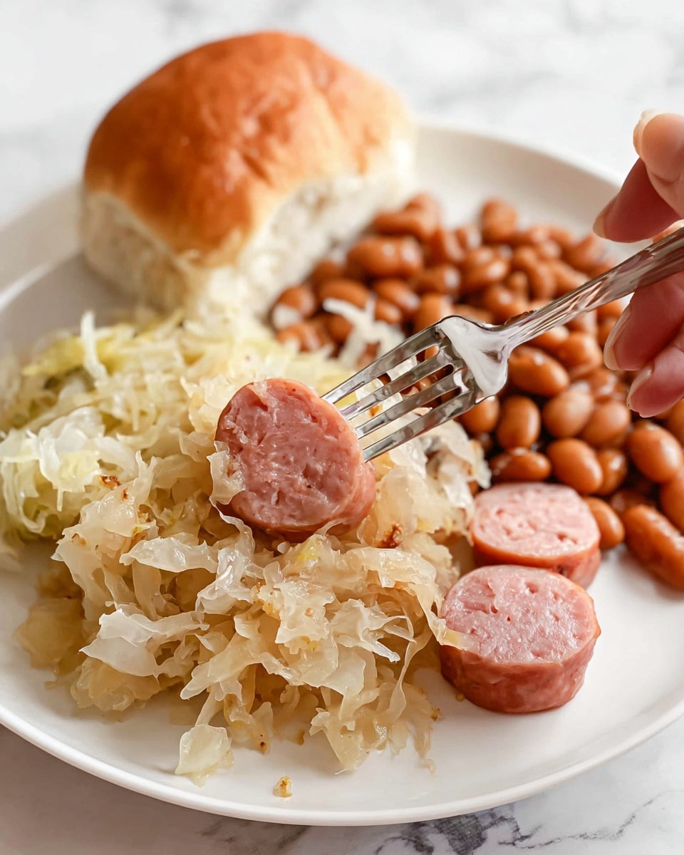 A close-up of a gray pan filled with shredded pale yellow sauerkraut mixed with sliced pink sausages. The sausages are cut into small round pieces scattered evenly throughout the sauerkraut. A turquoise spatula is partially visible on the right side, resting on the food. The pan sits on a dark surface, but the background is changed to a white marbled texture. The textures show the soft, wet sauerkraut clinging to the sausages, creating a simple, hearty dish. Photo taken with an iphone --ar 4:5 --v 7