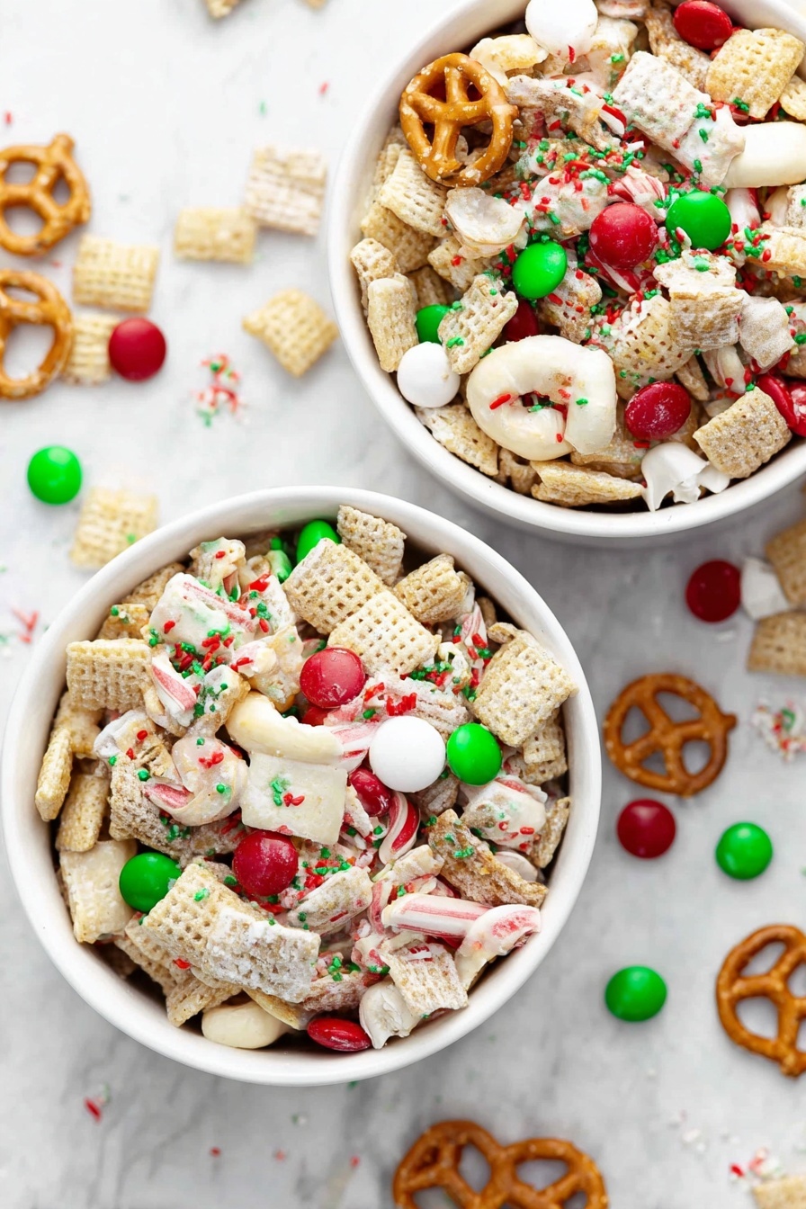 The image shows two white bowls filled with a festive snack mix on a white marbled surface. Each bowl holds a colorful mix of light beige square cereal pieces, white chocolate-covered pretzels, red and green candy-coated chocolates, and small round red, white, and green sprinkles scattered evenly over the mix. The colors are bright and create a holiday feel. Some pieces of the mix are scattered on the surface around the bowls. Photo taken with an iphone --ar 2:3 --v 7 - Festive Gluten-Free Christmas Chex Mix, gluten-free holiday snacks, Christmas party treats, easy holiday Chex mix recipe, colorful holiday snack